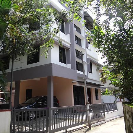 Anchorage Serviced Apartments Коччи Экстерьер фото