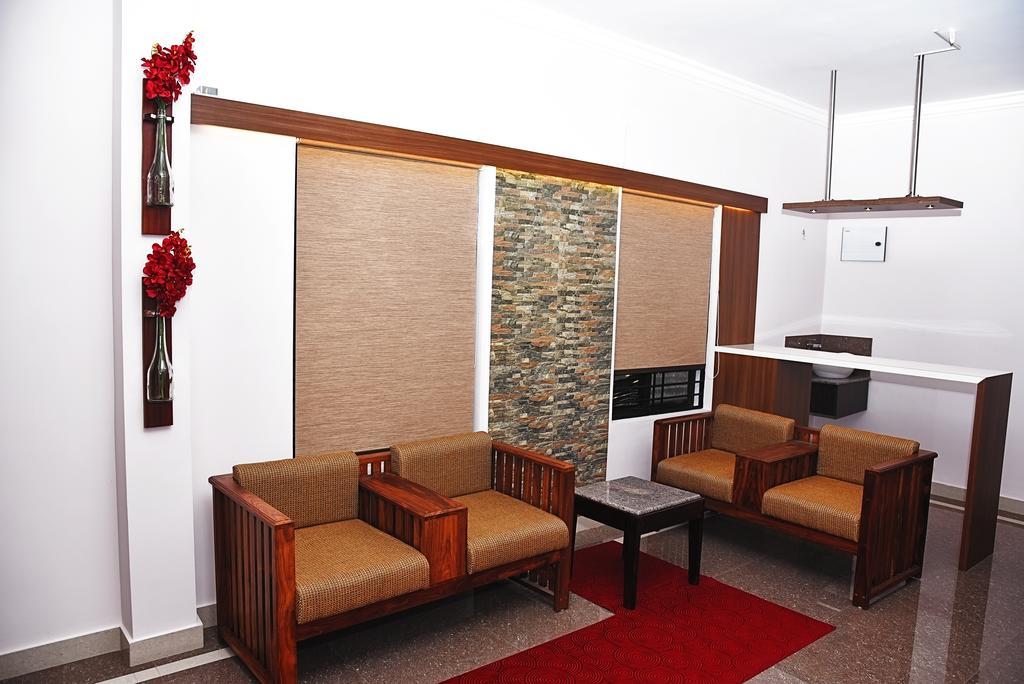 Anchorage Serviced Apartments Коччи Экстерьер фото