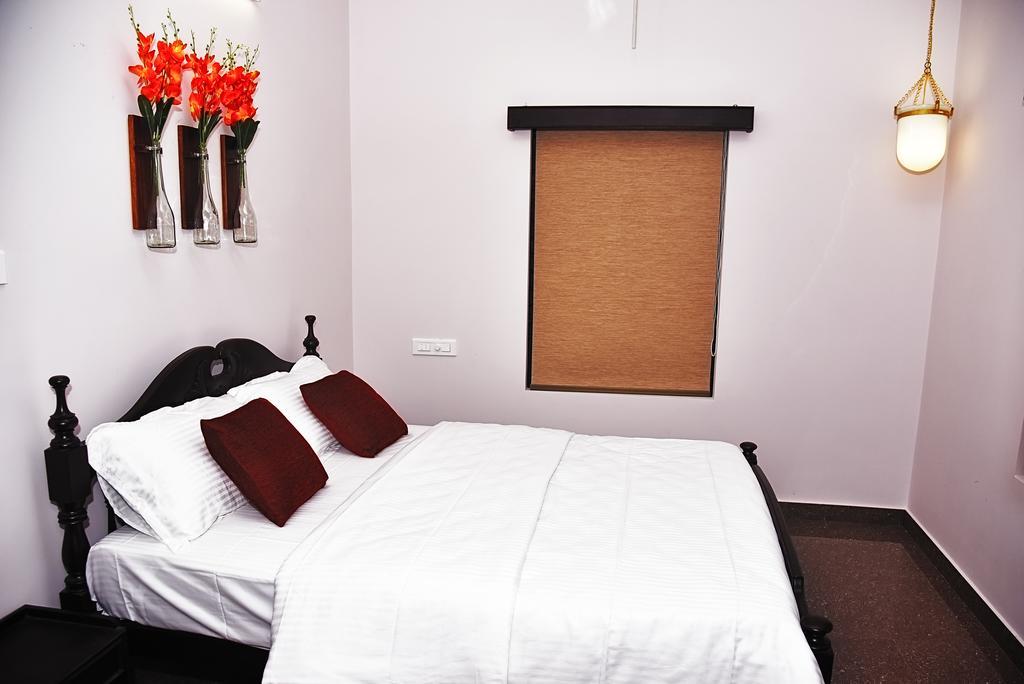 Anchorage Serviced Apartments Коччи Экстерьер фото